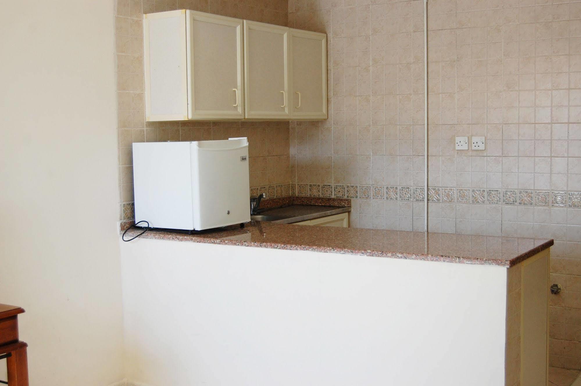 Al Ferdous Hotel Apartments Sharjah Buitenkant foto